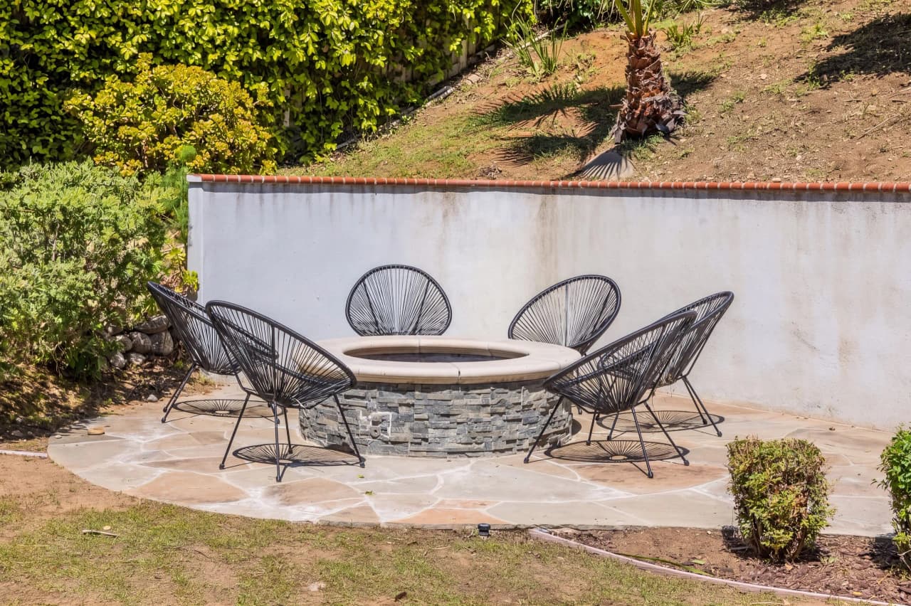 Ridgeview fire pit ringed by outdoor chairs
