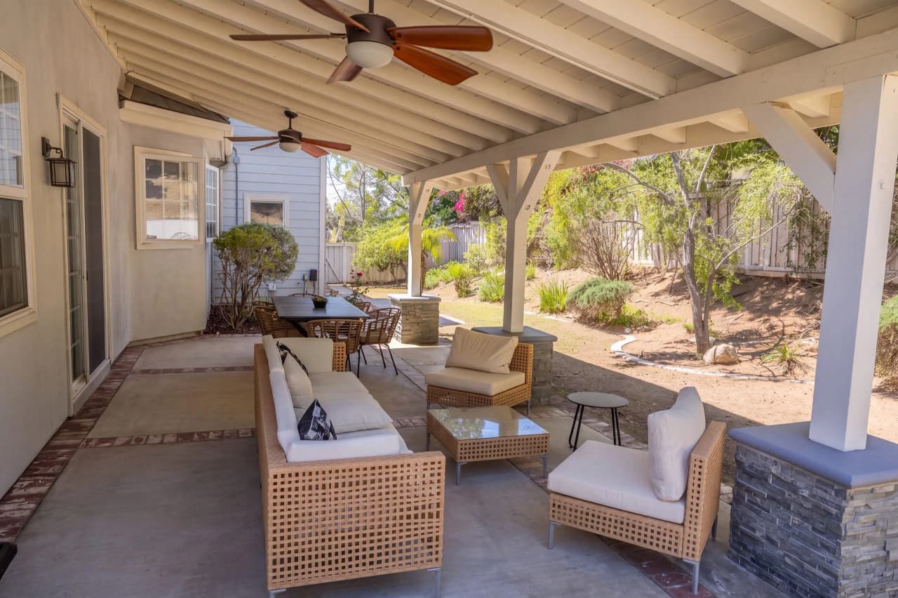 Wicker sofa and chairs under the Ridgeview patio cover