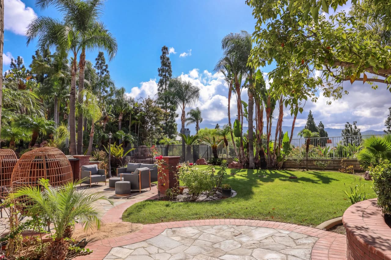 Shasta backyard lawn and garden with views of the hills